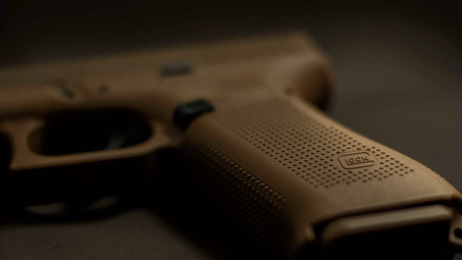 Close-up of a GLOCK pistol from One Stop Firearms’ original campaign